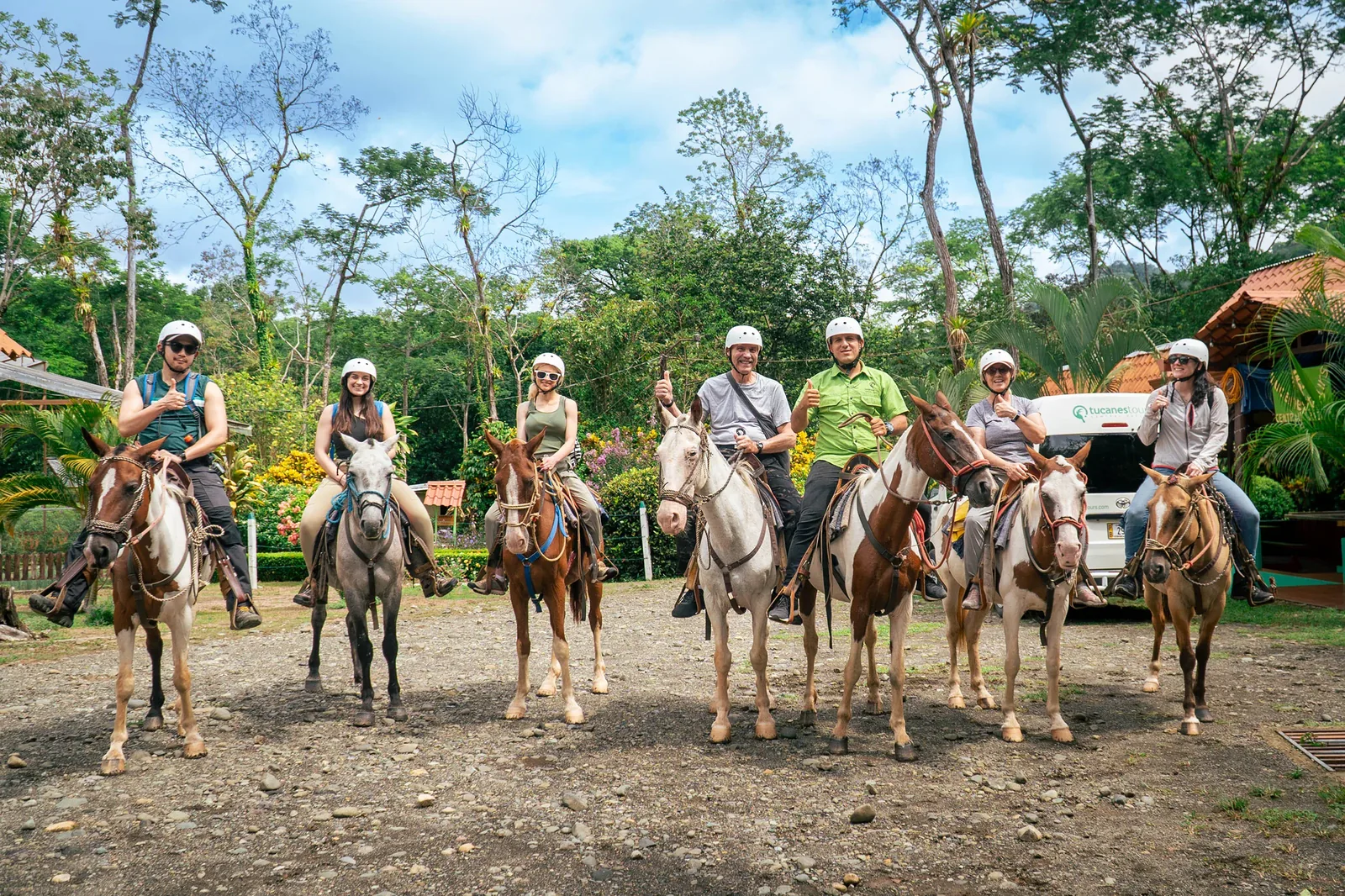 Horseback rider on a jungle trail on the Londres farm